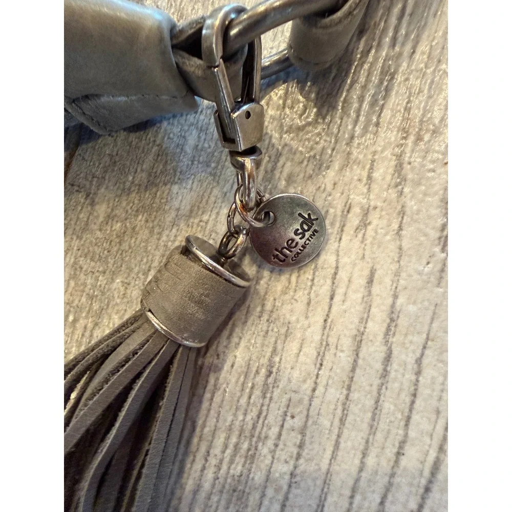 The Sak Collective Hobo crossbody Lucia Leather Tassel Braided purse Handbag